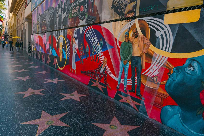 Los Angeles, California, USA - April 26, 2023. Hollywood Walk of Fame on a bright sunny day. The theater district is a famous tourist attraction.