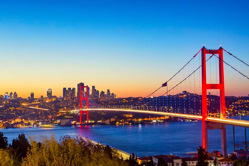 Istanbul Bosphorus Bridge or 15th July Martyrs Bridge at sunset. Istanbul, Turkey