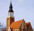 Co ma wspólnego hełm wieży oleśnickiego kościoła z kościołem Mariackim w Berlinie?